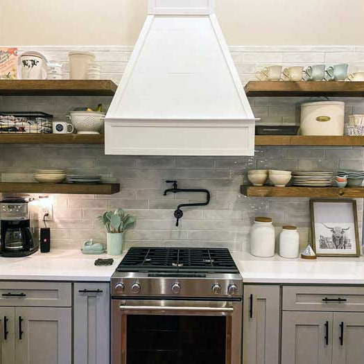 Craftsman Range Hood With Shaker Cabinets and Open Shelving in Rustic Kitchen