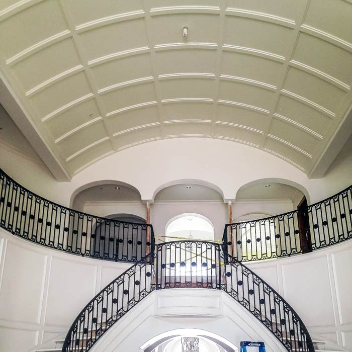 a barrel vault creates a modern ceiling for a grand entrance