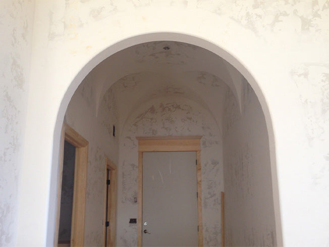 half circle arch under a groin vault