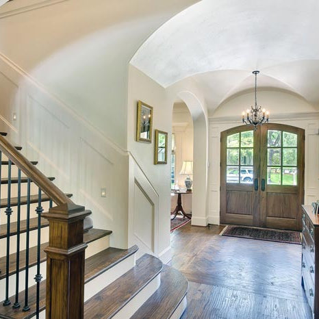 A traditional foyer with a groin vault ceiling and arched entryways - by Archways & Ceilings